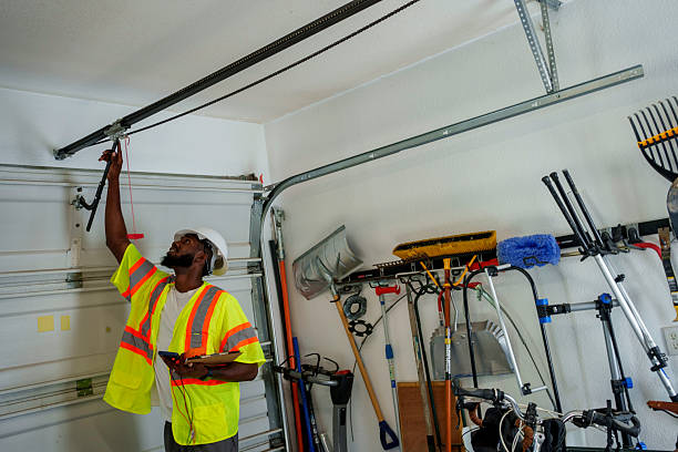 Professional Garage Door Panel Replacement technician working in Camanche, IA